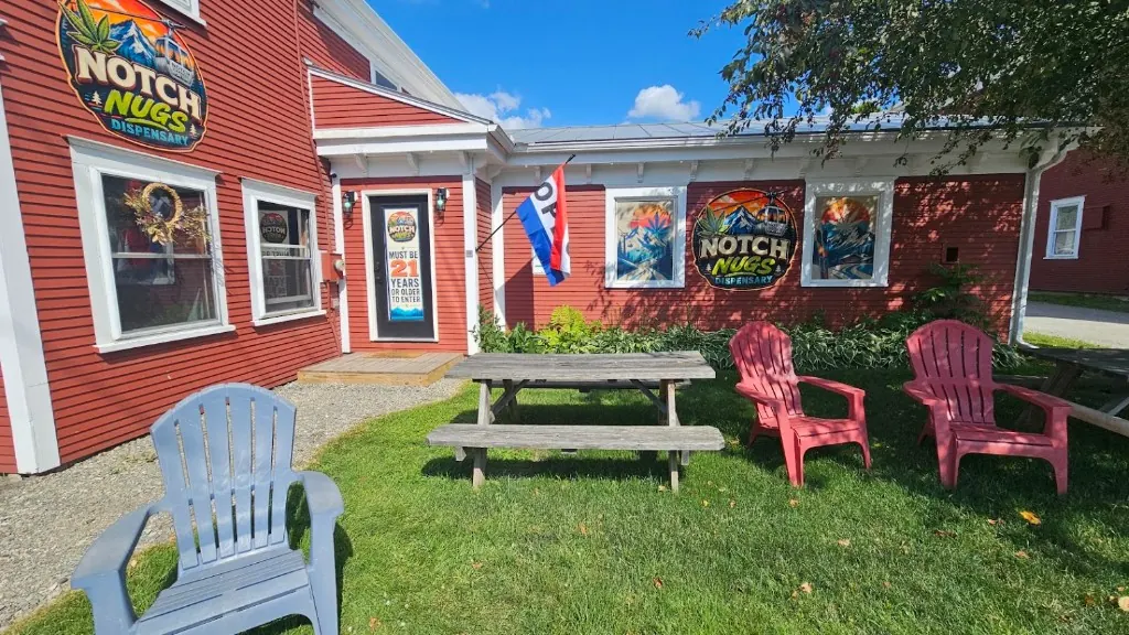 The red Notch Nugs shop on Main Street in Jeffersonville, with picnic tables and chairs out front